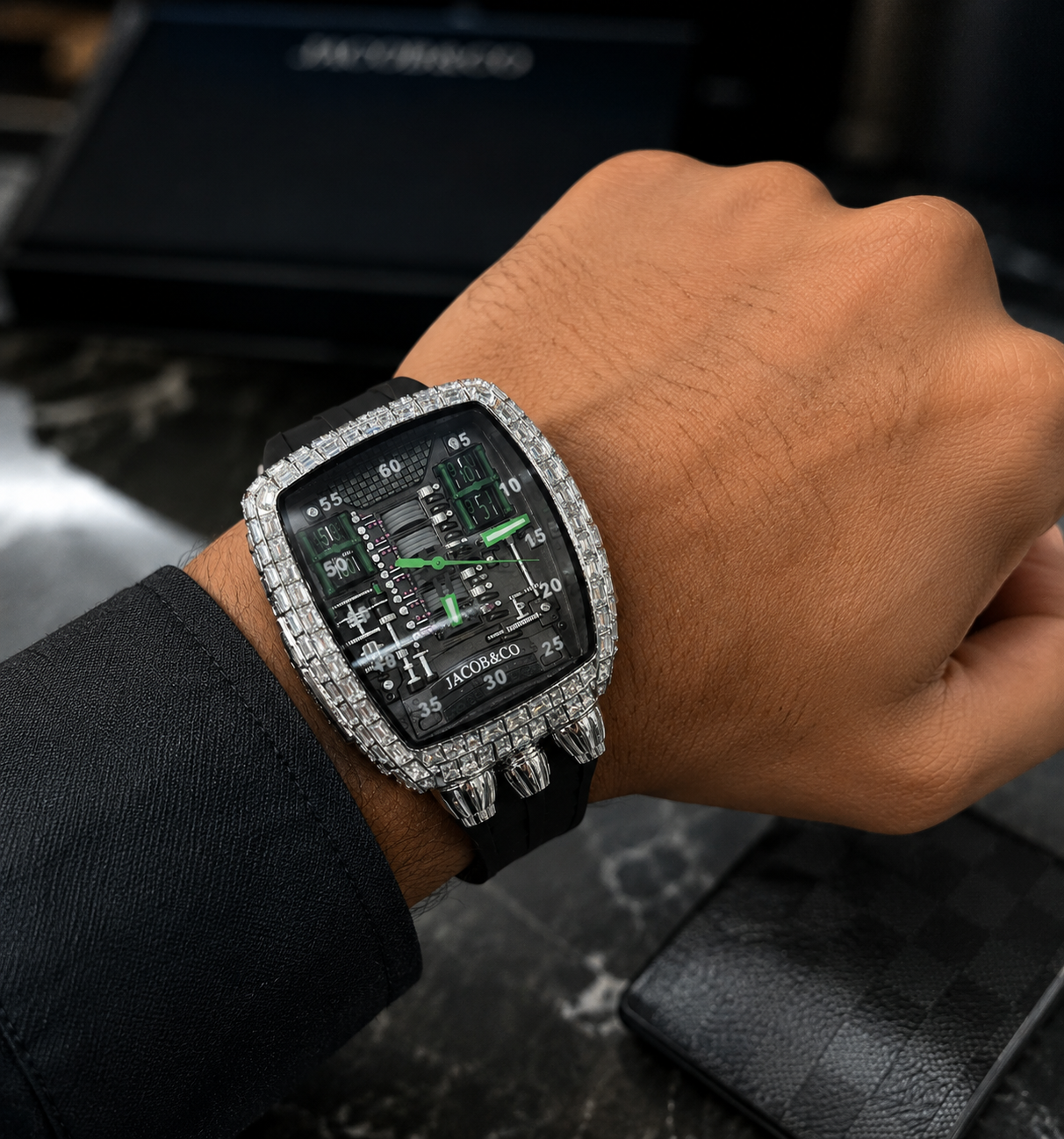 Luxury diamond-encrusted watch on a wrist with a blurred background