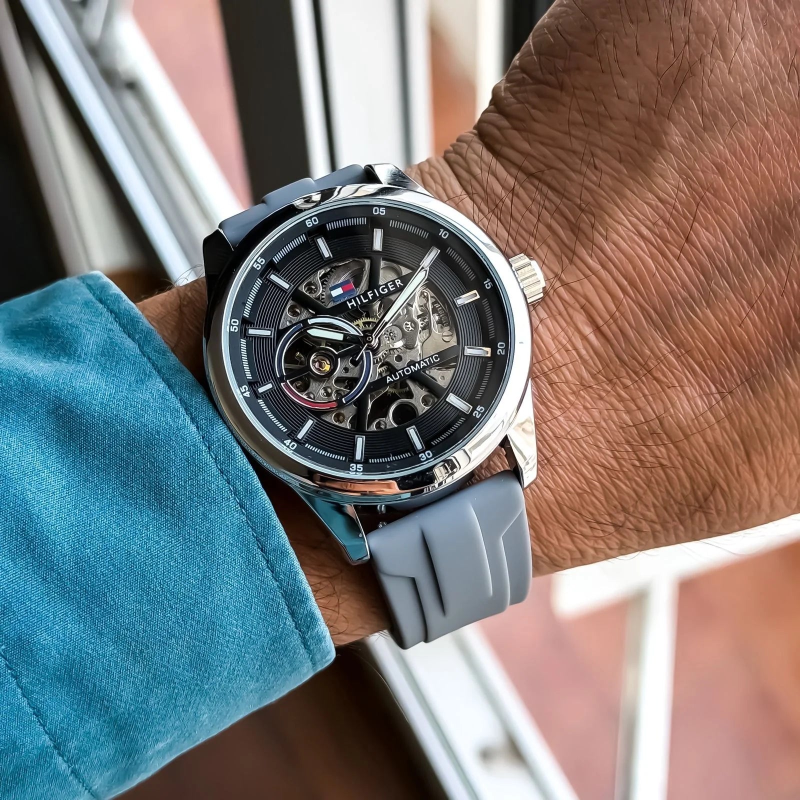 Men's Silver Skeleton Automatic Watch with Grey Silicone Strap